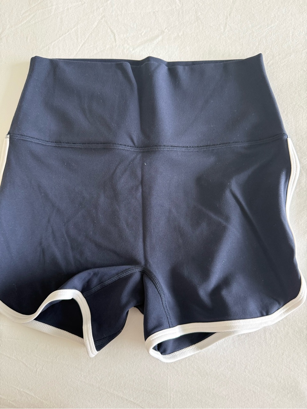 Athleta High-Waist Navy Athletic Shorts with White Trim